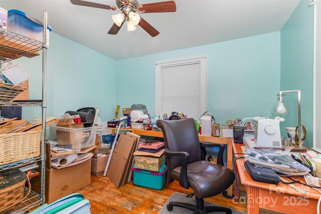 office area featuring wood finished floors and ceiling fan