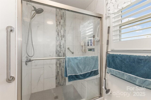 bathroom with a stall shower