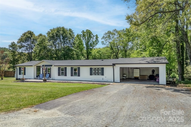 9 Ruby Dr, Hendersonville, NC 28792 - ranch-style house featuring fence, a front lawn, and aphalt driveway