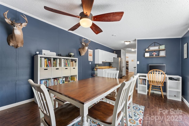 9 Ruby Dr, Hendersonville, NC 28792 - dining area with ornamental molding, a textured ceiling, ceiling fan, and wood finished floors