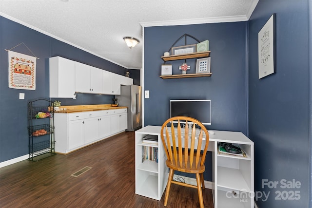 9 Ruby Dr, Hendersonville, NC 28792 - dining space featuring visible vents, ornamental molding, baseboards, dark wood-type flooring, and a textured ceiling
