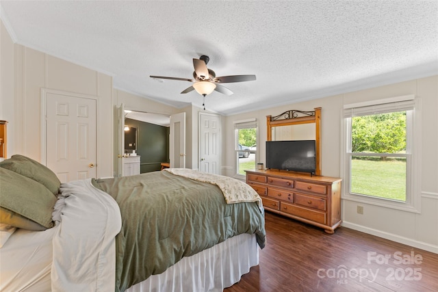 9 Ruby Dr, Hendersonville, NC 28792 - bedroom with crown molding, a textured ceiling, dark wood finished floors, a ceiling fan, and baseboards