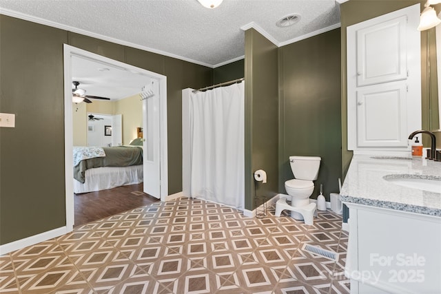 9 Ruby Dr, Hendersonville, NC 28792 - ensuite bathroom with crown molding, toilet, a shower with shower curtain, ceiling fan, and a textured ceiling