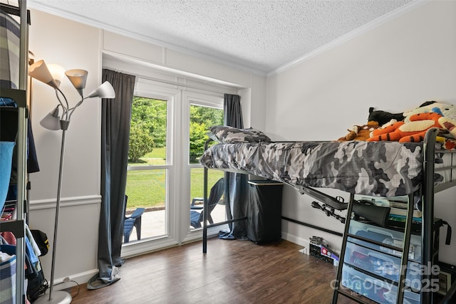 9 Ruby Dr, Hendersonville, NC 28792 - bedroom with baseboards, a textured ceiling, ornamental molding, and wood finished floors