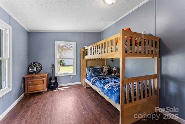 9 Ruby Dr, Hendersonville, NC 28792 - bedroom featuring ornamental molding, a textured ceiling, and wood finished floors