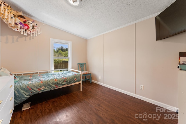 9 Ruby Dr, Hendersonville, NC 28792 - bedroom with crown molding, a textured ceiling, vaulted ceiling, and wood finished floors