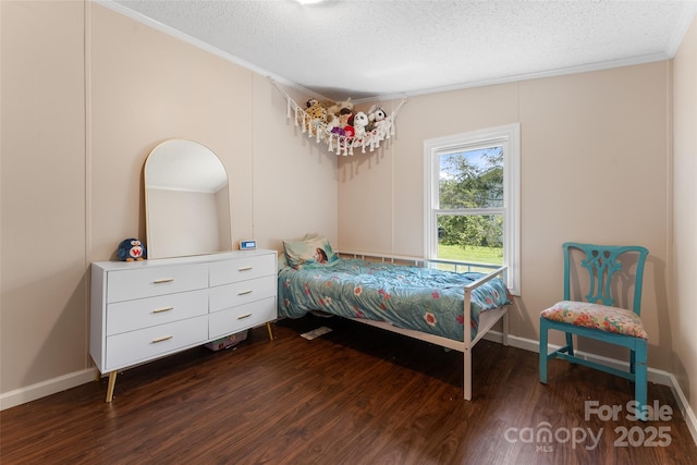 9 Ruby Dr, Hendersonville, NC 28792 - bedroom with crown molding, dark wood-style flooring, a textured ceiling, and baseboards