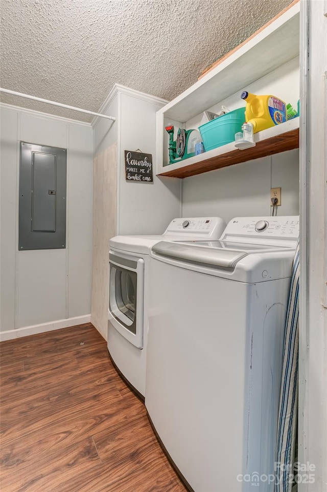 9 Ruby Dr, Hendersonville, NC 28792 - laundry area with laundry area, washer and clothes dryer, a textured ceiling, electric panel, and dark wood finished floors