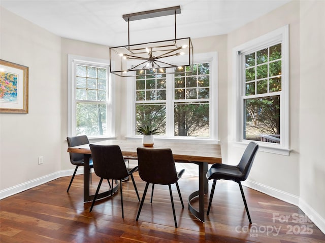 44 Chip Shot Ct, Mills River, NC 28759 - dining area featuring baseboards, a chandelier, and dark wood-style floors