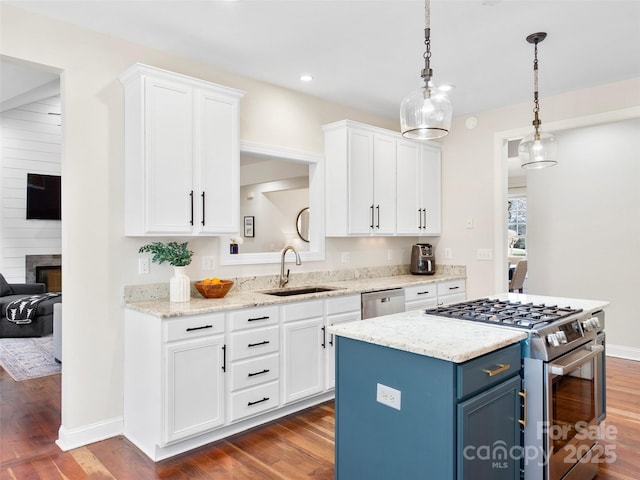 44 Chip Shot Ct, Mills River, NC 28759 - kitchen with stainless steel appliances, white cabinetry, a sink, and blue cabinets