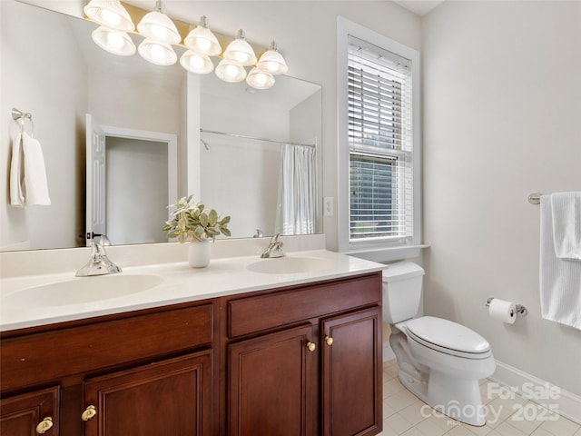 44 Chip Shot Ct, Mills River, NC 28759 - full bath featuring double vanity, toilet, tile patterned floors, and a sink