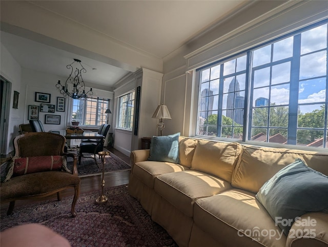 301 W 10th St W, Charlotte, NC 28202 - living area featuring a chandelier, plenty of natural light, and wood finished floors