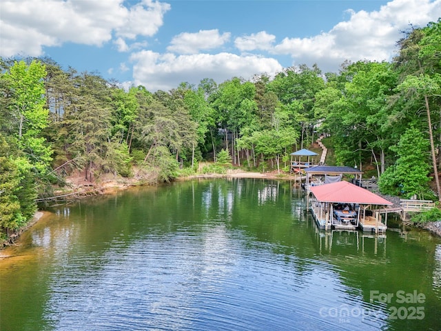 16427 Cozy Cove Rd, Charlotte, NC 28278 - dock area featuring boat lift and a water view