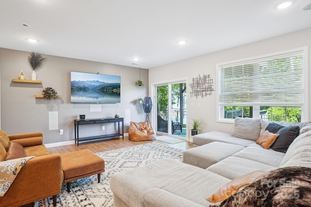 16427 Cozy Cove Rd, Charlotte, NC 28278 - living room with recessed lighting, wood finished floors, and baseboards