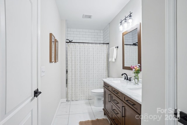16427 Cozy Cove Rd, Charlotte, NC 28278 - full bathroom featuring double vanity, toilet, and marble finish flooring