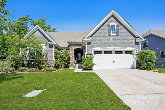 16427 Cozy Cove Rd, Charlotte, NC 28278 - craftsman house featuring concrete driveway, a front yard, a garage, and stone siding