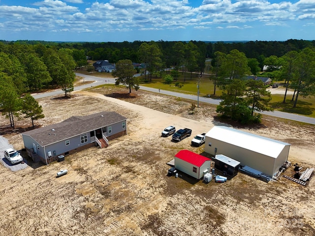 aerial view featuring a forest view