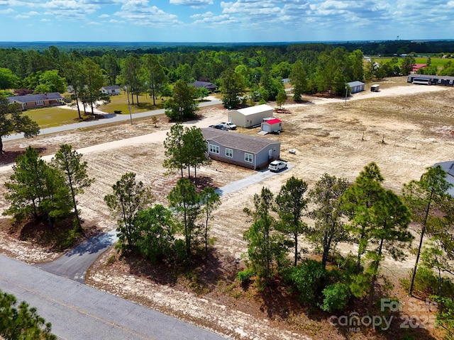 drone / aerial view with a forest view