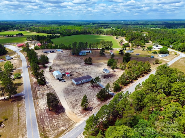bird's eye view with a forest view