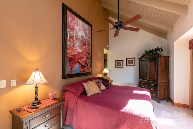 bedroom featuring light colored carpet, baseboards, and wooden ceiling