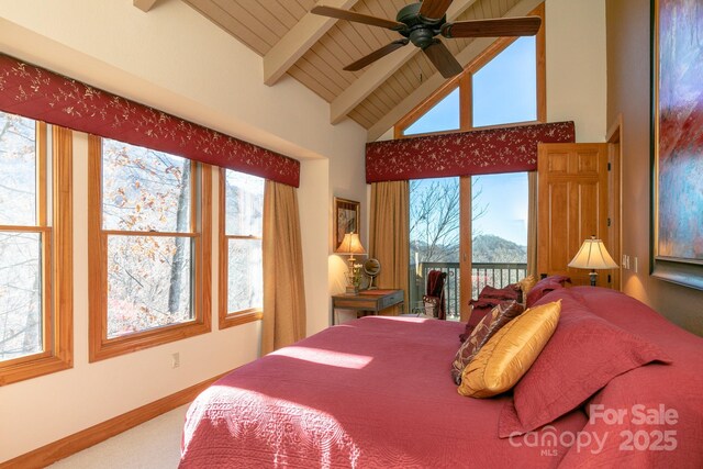 bedroom with beamed ceiling, high vaulted ceiling, access to exterior, carpet, and baseboards