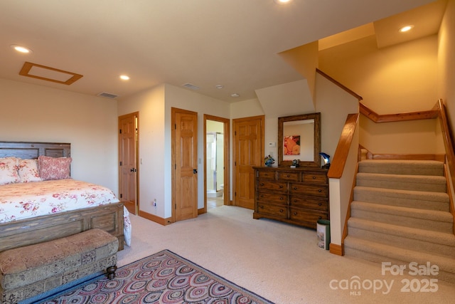 bedroom featuring attic access, baseboards, carpet flooring, and recessed lighting