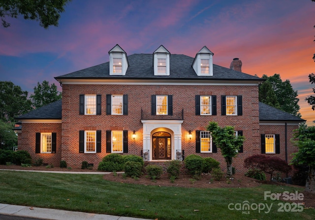 3314 Leamington Ln, Charlotte, NC 28226 - colonial-style house featuring a chimney, a front yard, and brick siding