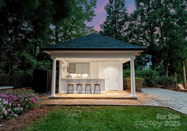 3314 Leamington Ln, Charlotte, NC 28226 - patio terrace at dusk featuring a gazebo and a patio area