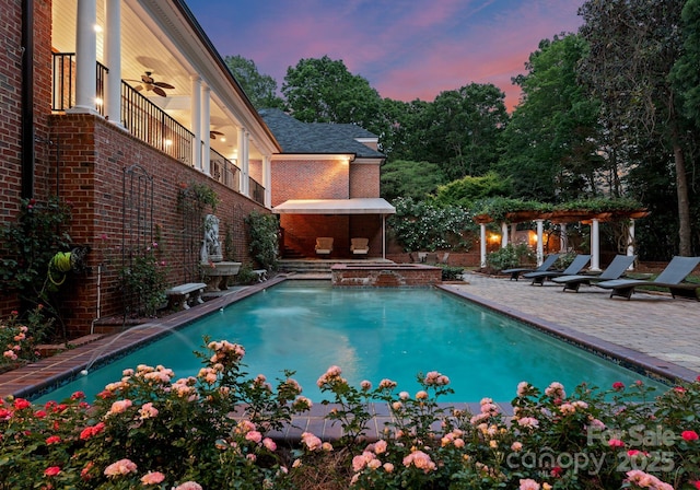 3314 Leamington Ln, Charlotte, NC 28226 - swimming pool featuring a ceiling fan, a pergola, and a patio area