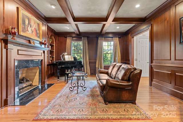 3314 Leamington Ln, Charlotte, NC 28226 - living area featuring light wood-style flooring, beam ceiling, a premium fireplace, ornamental molding, and recessed lighting