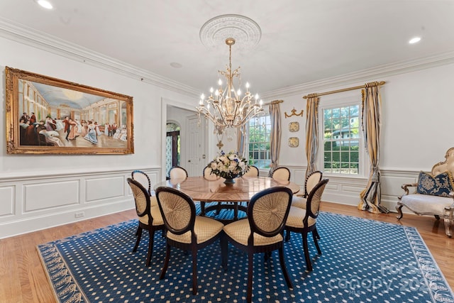 3314 Leamington Ln, Charlotte, NC 28226 - dining area featuring a chandelier, ornamental molding, a wainscoted wall, wood finished floors, and recessed lighting