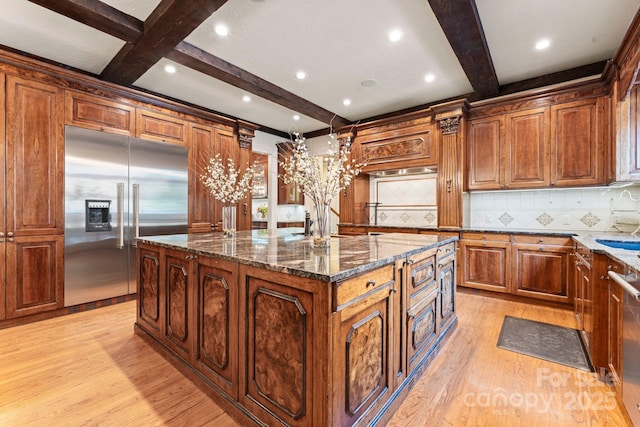 3314 Leamington Ln, Charlotte, NC 28226 - kitchen with stainless steel built in fridge, a large island with sink, light wood-type flooring, beamed ceiling, and backsplash