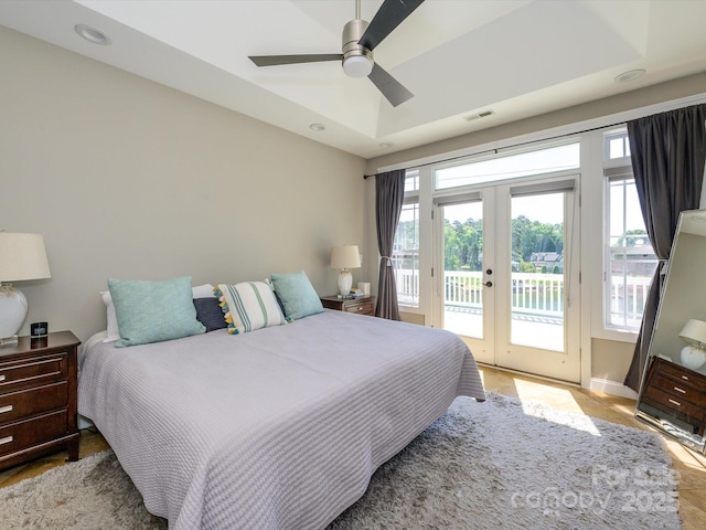 bedroom featuring french doors, access to exterior, visible vents, baseboards, and ceiling fan