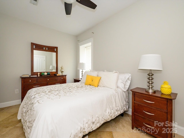 bedroom with baseboards and ceiling fan
