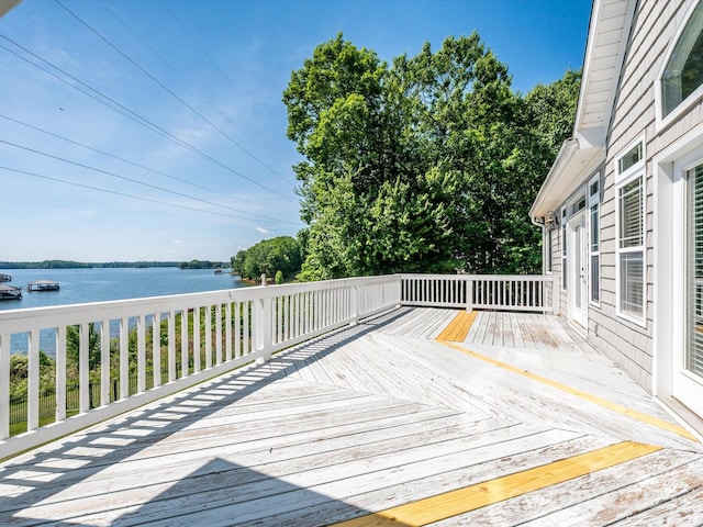 deck featuring a water view