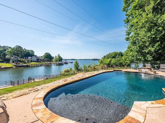view of swimming pool featuring a water view, fence, and a fenced in pool