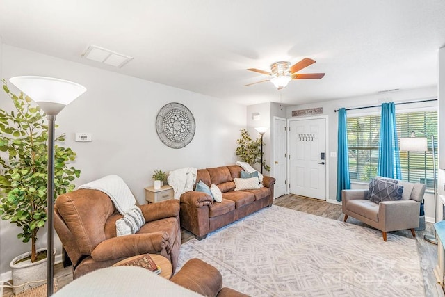 41 Lanceford Cir, Fletcher, NC 28732 - living room featuring a ceiling fan, wood finished floors, and baseboards
