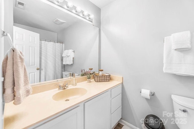 41 Lanceford Cir, Fletcher, NC 28732 - bathroom with toilet, vanity, and a shower with shower curtain