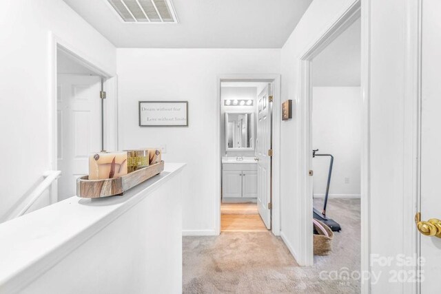 41 Lanceford Cir, Fletcher, NC 28732 - hall featuring light carpet, baseboards, and a sink