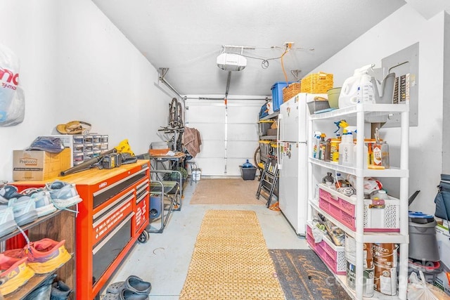 41 Lanceford Cir, Fletcher, NC 28732 - garage with freestanding refrigerator and a garage door opener