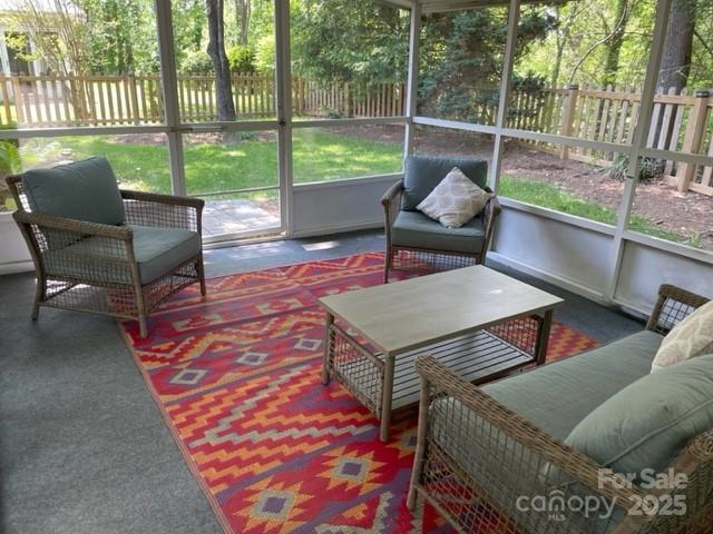 sunroom / solarium with an outdoor living space