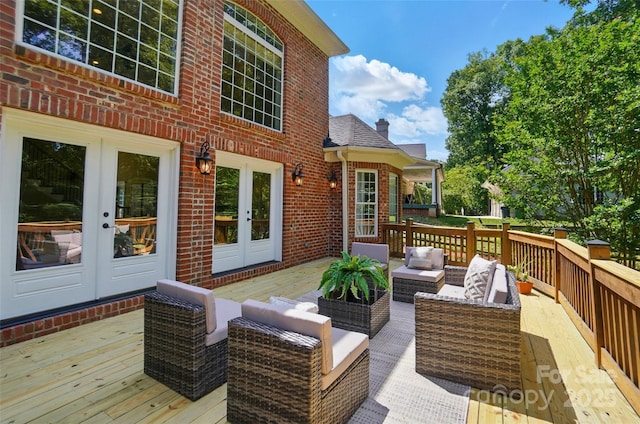 deck featuring french doors and an outdoor hangout area