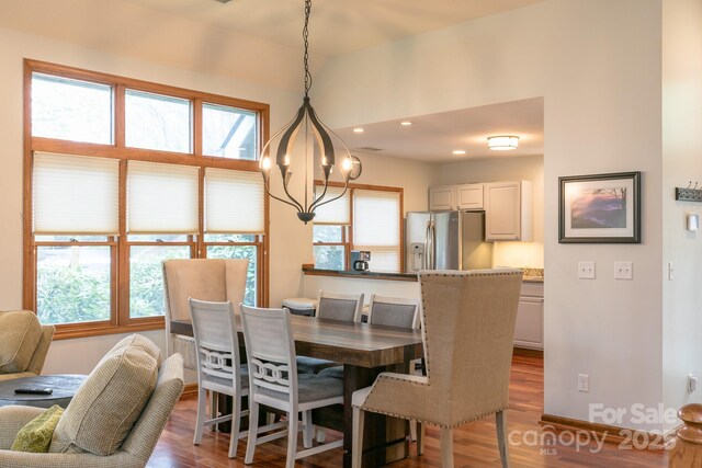 220 Stoney Falls Loop Unit C/2, Burnsville, NC 28714 - dining space with baseboards, recessed lighting, a notable chandelier, and dark wood-style floors