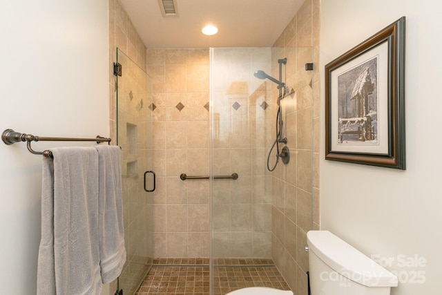 220 Stoney Falls Loop Unit C/2, Burnsville, NC 28714 - full bathroom featuring toilet, visible vents, a shower stall, and recessed lighting