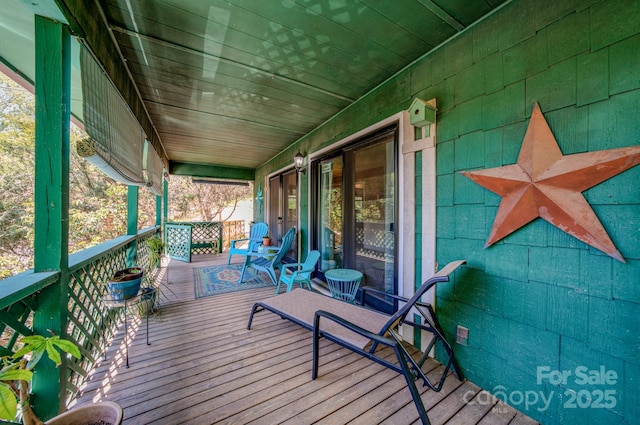 wooden terrace with covered porch