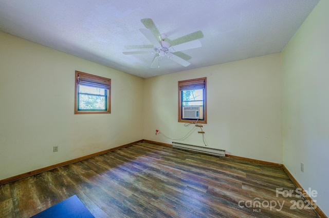 empty room with baseboards, a baseboard radiator, ceiling fan, and wood finished floors