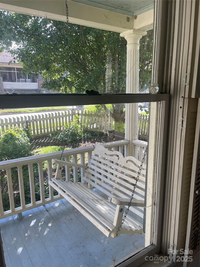 wooden deck featuring a porch