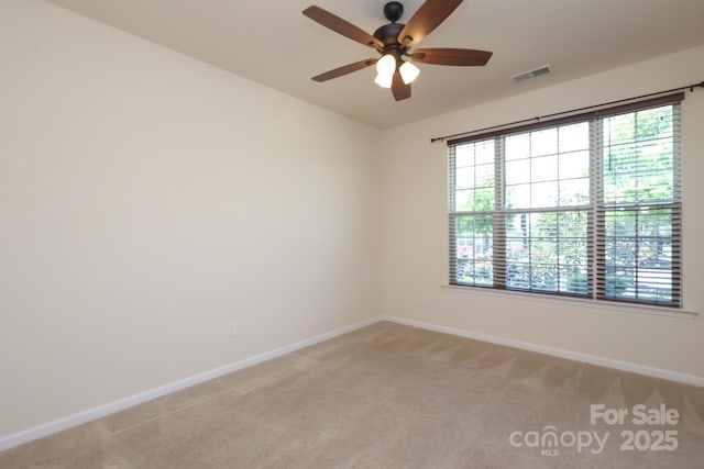 309 Kentmere Ln, Clover, SC 29710 - spare room with a ceiling fan, baseboards, light colored carpet, and visible vents