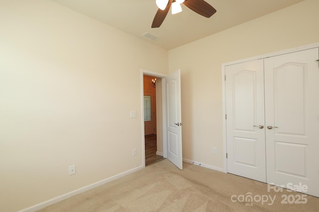 309 Kentmere Ln, Clover, SC 29710 - unfurnished bedroom featuring a ceiling fan, visible vents, baseboards, a closet, and light carpet