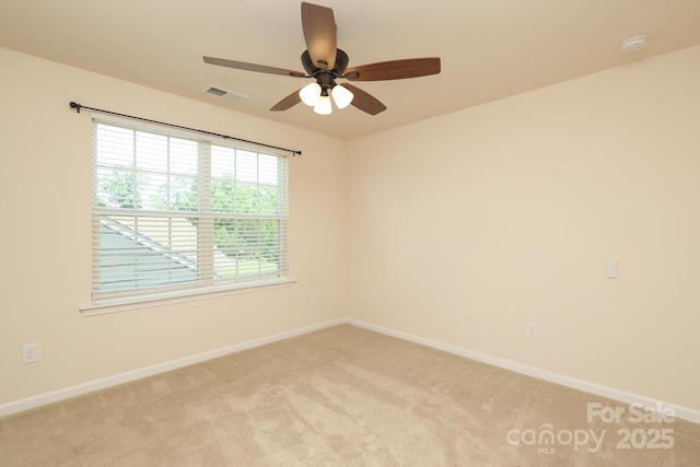 309 Kentmere Ln, Clover, SC 29710 - spare room with visible vents, a ceiling fan, baseboards, and light carpet